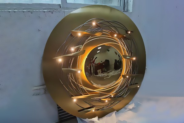 Round Stainless Steel Wall Sculpture with Gold Mirror Center and Leaf Accents – Custom Size  Round Stainless Steel Wall Sculpture with Gold Mirror Center and Leaf Accents – Custom Size